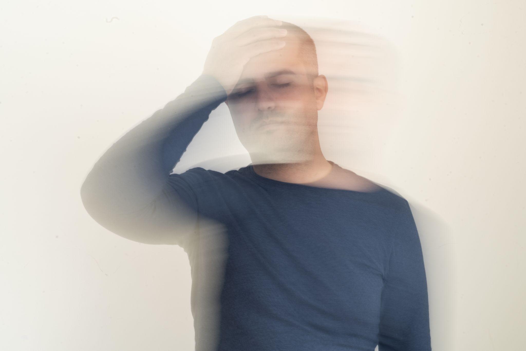 Close up photo of man with vertigo ilness.