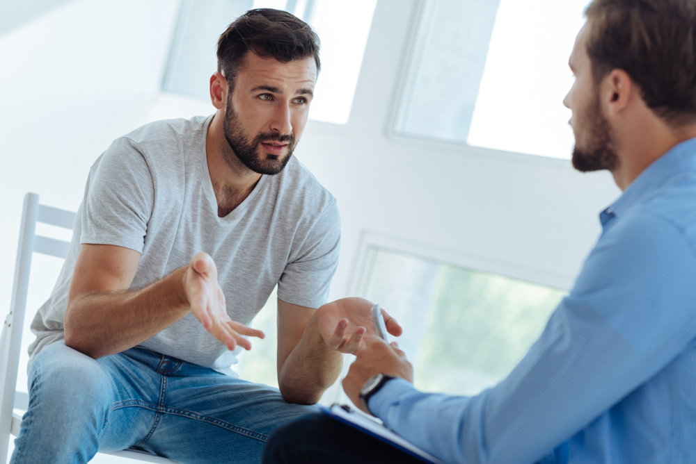 cheerless young man seeks therapist’s advice in Walnut, CA