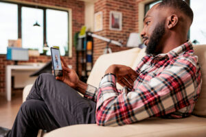 man using telehealth for comprehensive addiction treatment in Ventura