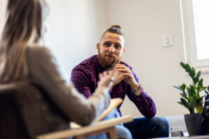man listening to his therapist about addiction recovery at addiction treatment programs, rosemead
